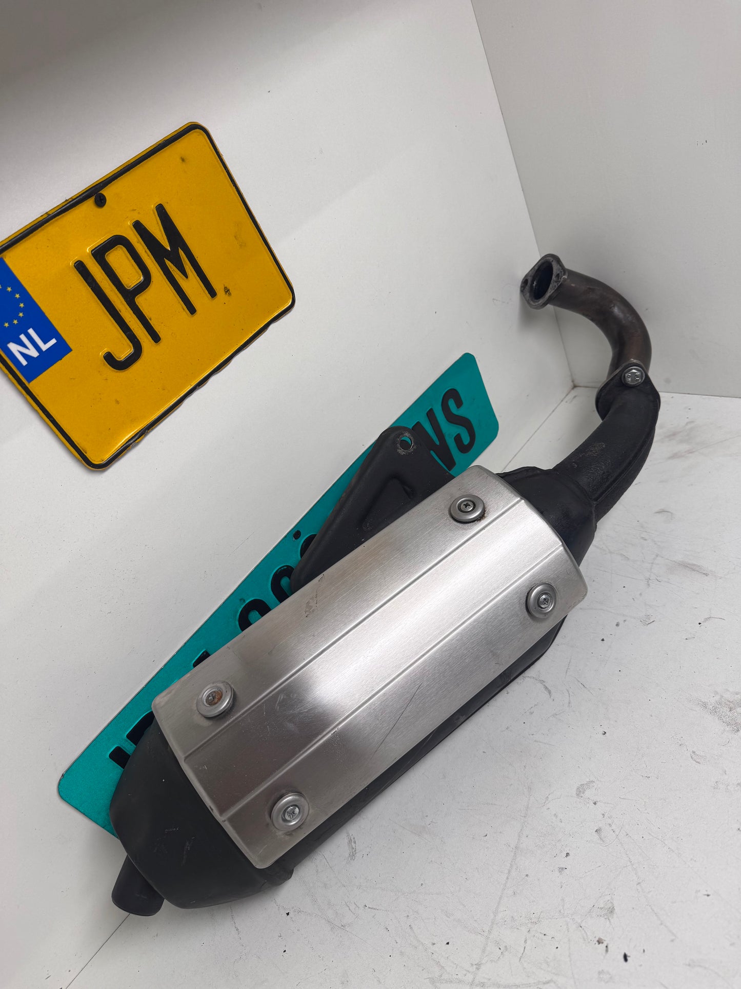 SM06 uitlaat origineel met rvs bocht 125cc/180cc