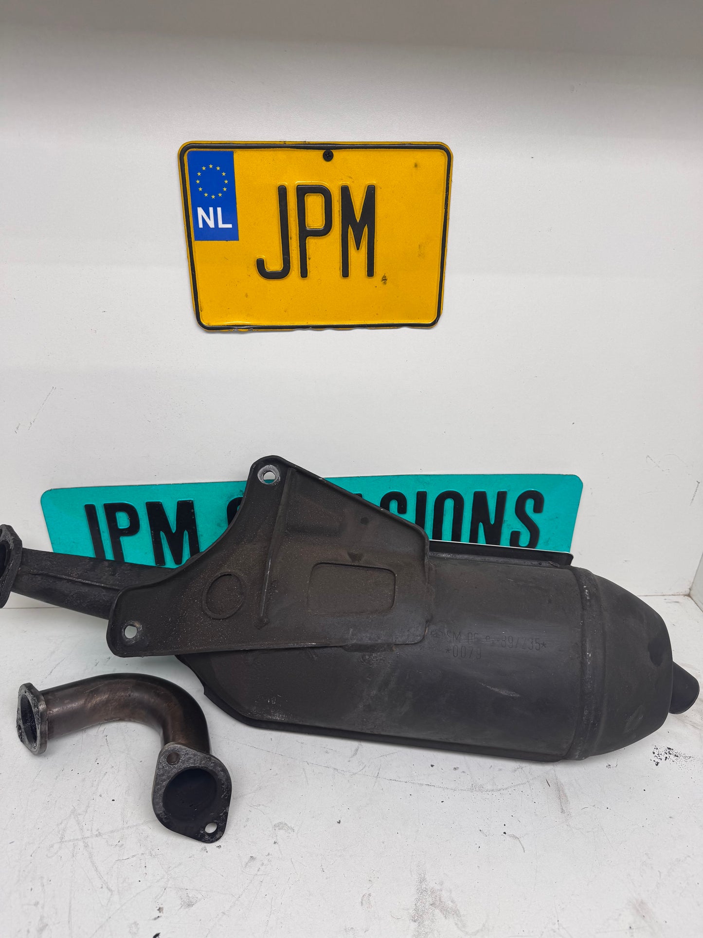 SM06 uitlaat origineel met rvs bocht 125cc/180cc